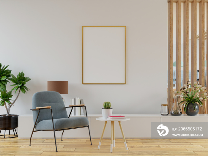 Poster mockup with vertical frames on empty wall in livingroom interior with velvet armchair.