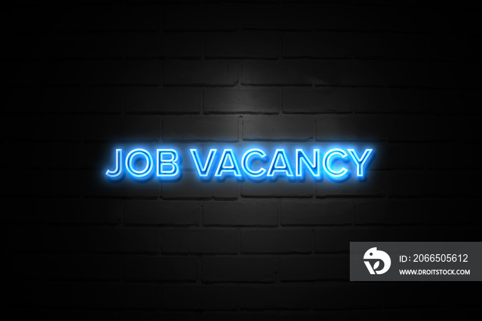 Job Vacancy neon Sign on brickwall