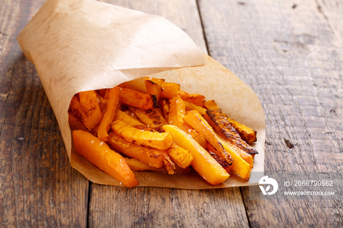 Baked butternut squash fries with sea salt. Pumpkin chips.