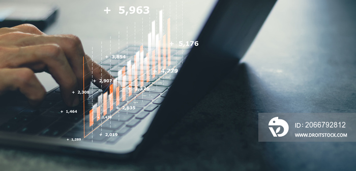 Laptop or computer with chart. Investment in business and financial