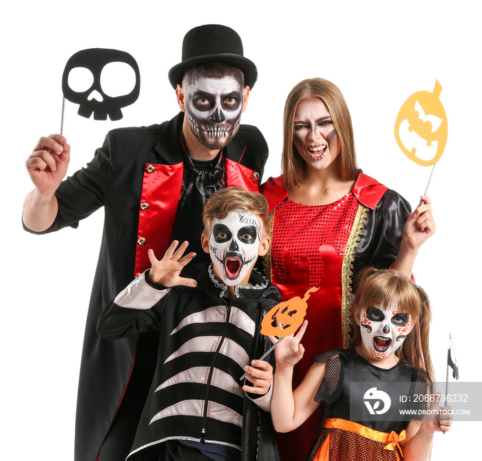 Family in Halloween costumes on white background