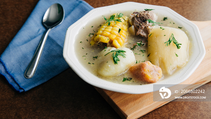 typical Colombian dish sancocho soup, meat, cob, potato