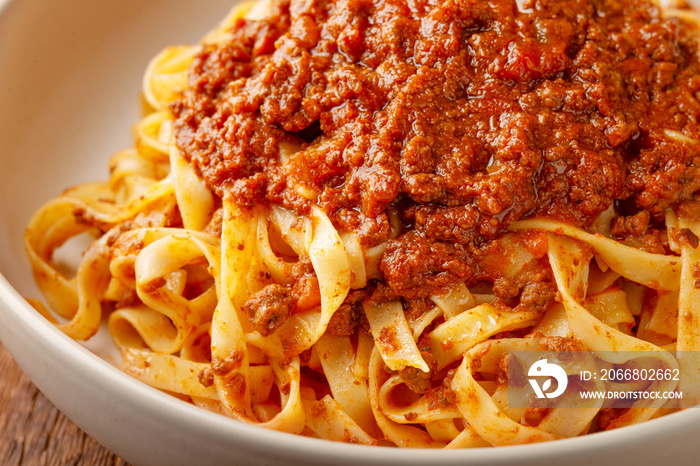 Close up of BOLOGNESE SAUCE with tagliatelle paste