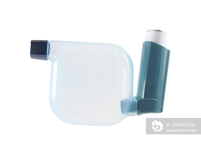 Blue asthma inhaler with spacer isolated on white background. Pharmaceutical product is used to treat or prevent asthma attack. Health and medical concept.