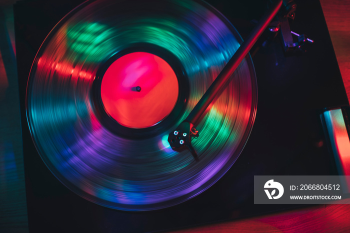 Turntable play vinyl record with light show effects