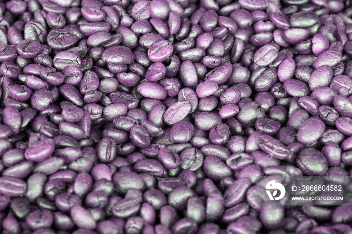 Roasted purple coffee beans in a sack