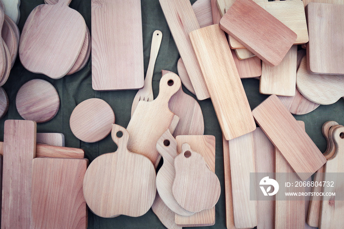 Wood products for handmade kitchen. Arts and crafts fair. Background image.