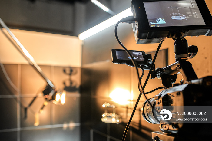 Behind the scenes of filming movies and video products, setting up equipment for shooting video and sound. The concept of producing video content for social networks, TV and blogs.