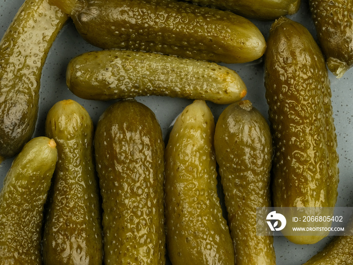 Top view of pickled cucumbers on the table