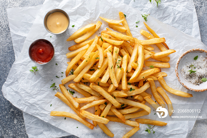 French fries with ketchup and cocktail sauce