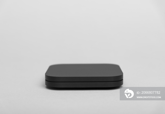 TV set-top box for ip tv and digital video content on a gray background. Digital TV on gray background.
