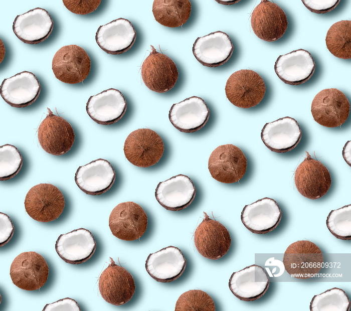 Coconut pattern on pastel blue background. Summer concept. Flat lay, top view. Banner