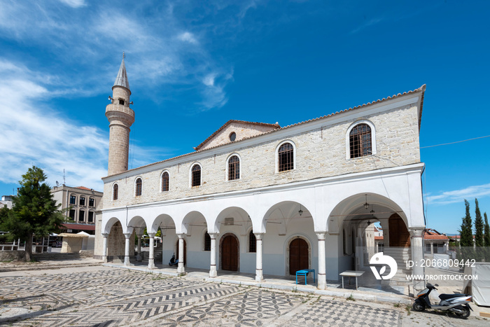 streets of alacati with a mosque, a small town with touristic attraction alacati night life hotels clubs and restaurants