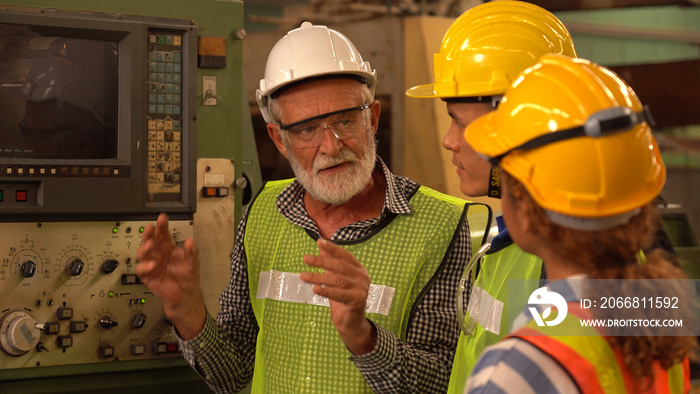 Team Of Engineers Having Discussion