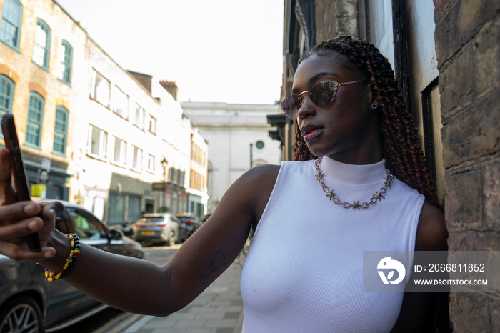 Woman holding smart phone