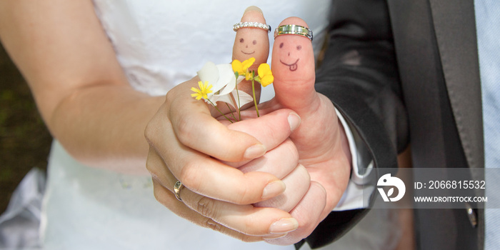 fingers painted with the bride and groom for wedding symbol