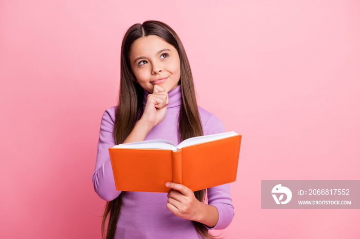 Portrait of her she nice attractive pretty cute creative curious brainy smart clever long-haired girl reading academic paper book pondering isolated over pink pastel color background