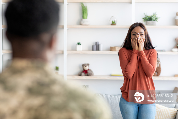 Surprised Black Wife Welcoming Soldier Husband At Home After Army