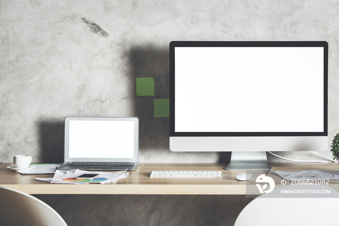 Creative designer desktop with white devices