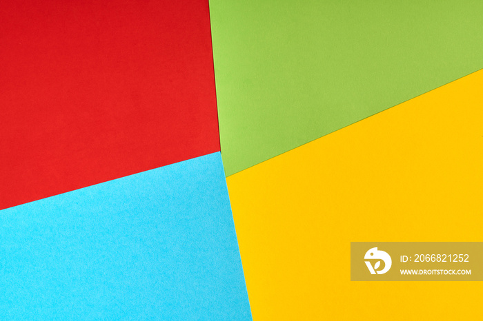 Red, green, blue, yellow paper colours. Corporation logo concept.