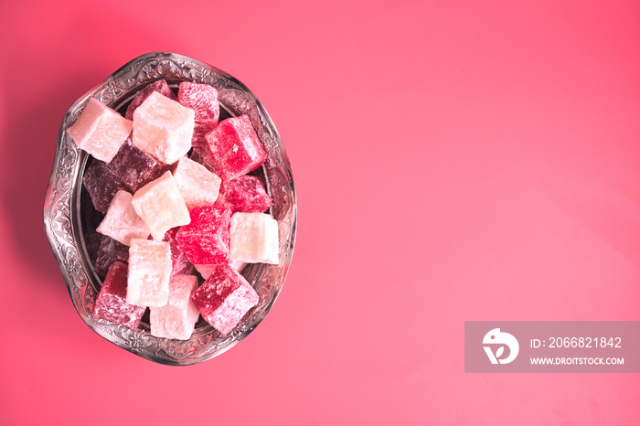 Turkish delight. Flavoured Turkish delights on isolated surface