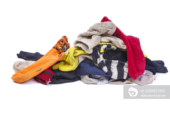 Pile of dirty multicolored socks isolated on a white background