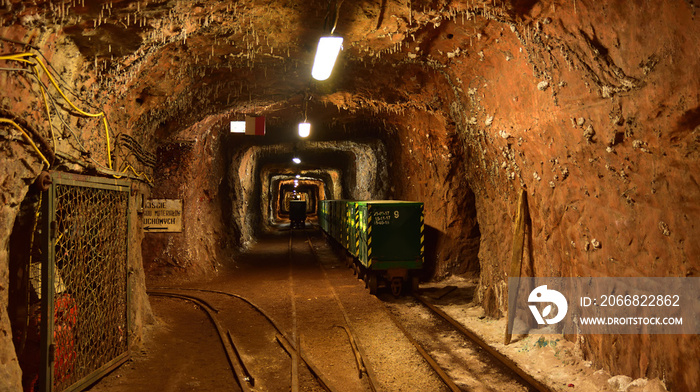 Trams of underground salt mine railway with explosives