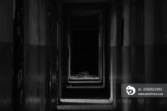 dark abandoned corridor of empty premises in dnipro city in ukraine