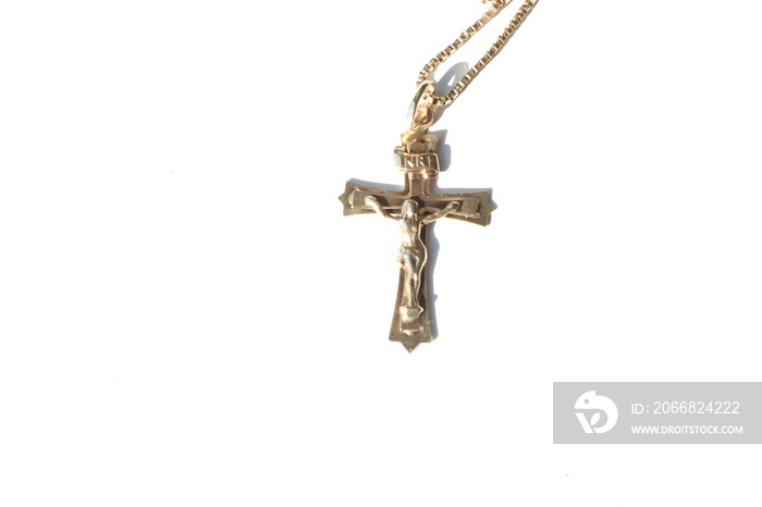 Gold Chain with hanger pendant jesus crusified cross on a white background