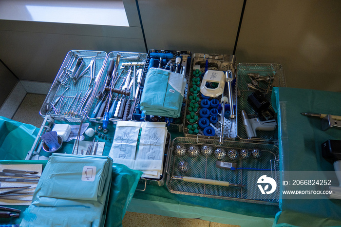 in  operating room there are many instruments for performing a hip implantation