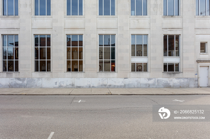 Block office building with tall windows