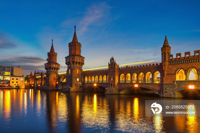 Berlin Germany, night city skyline at Oberbaum Bridge and Berlin Metro