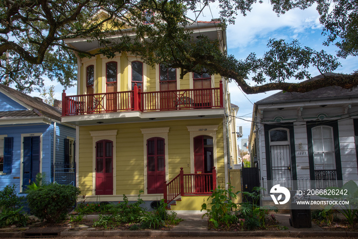 Red and yellow shotgun house in Treme (NOLA)