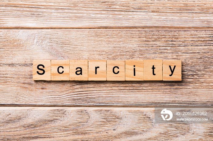 scarcity word written on wood block. scarcity text on wooden table for your desing, concept