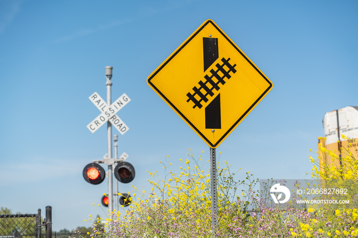 Skewed railroad crossing sign. Traffic sign  The railroad crossing