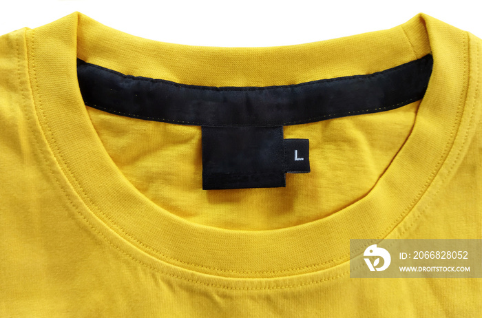 A closer look at the round neck t-shirt back and front neck drop. Attached neck tape and a woven label t-shirt.