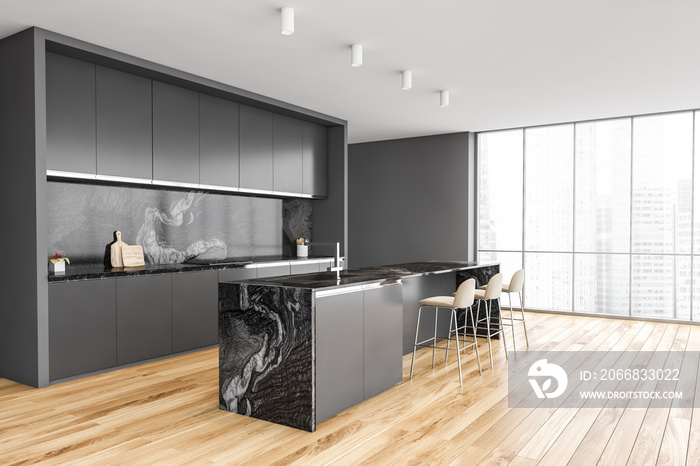 Black and wooden kitchen, table and chairs and window with city view