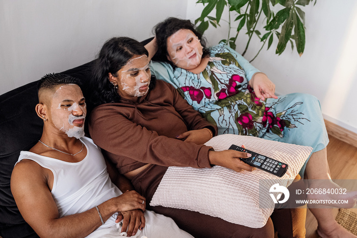 Friends doing face masks together at home