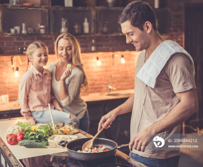 Young family cooking