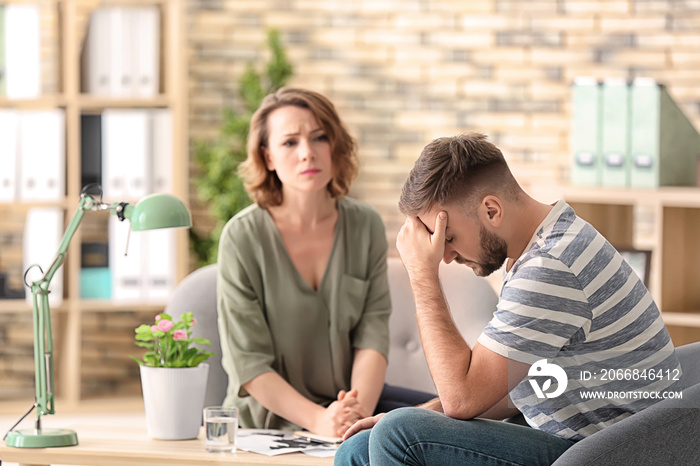 Female psychologist working with patient in office