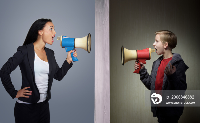 Tween son and his mother shouting through the megaphones at each other