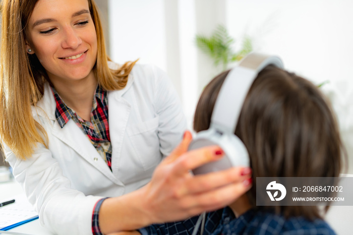 Hearing Test for Children - Audiologist Working with a Little Boy