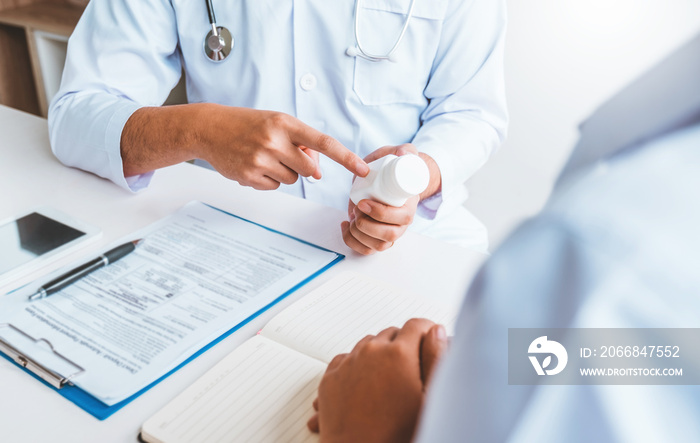 Doctors and patients Consulting about Treatment guidelines at office