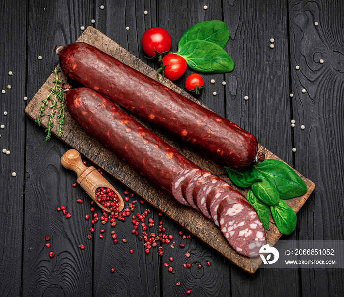 Smoked sausage from different types of meat