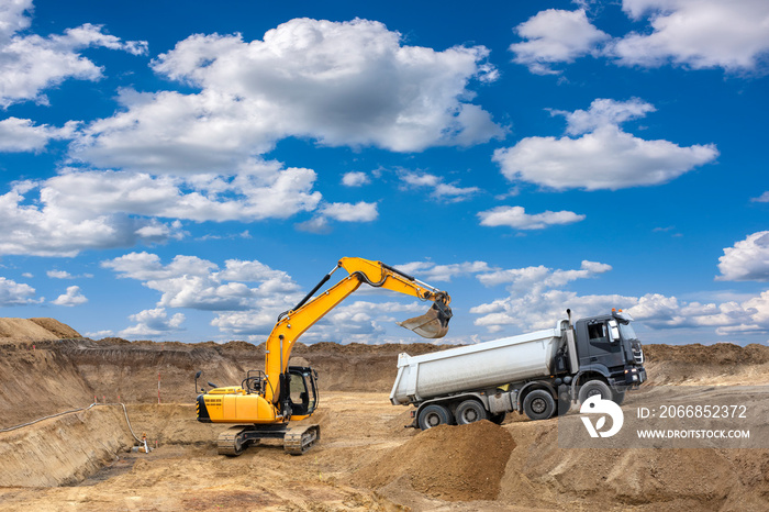 excavator is working and digging in construction site