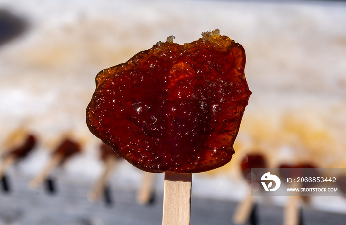 Maple taffy on the snow, Ontario, Canada