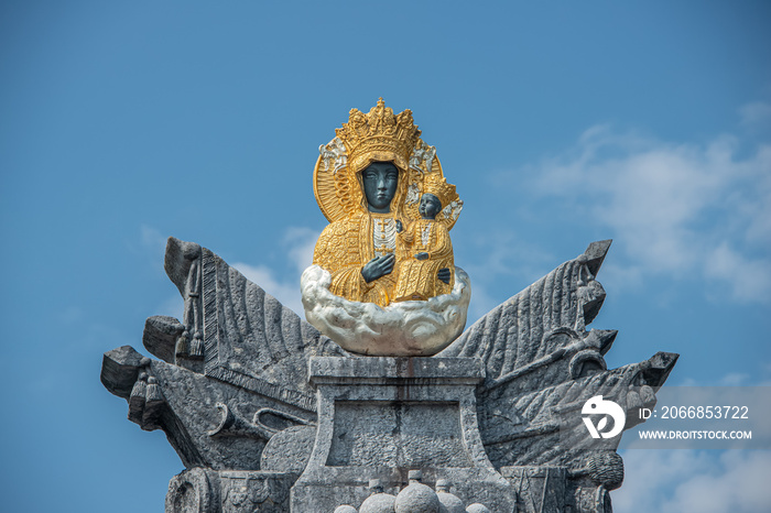 Figure of the black Madonna on top of one of the gates in Jasna Gora