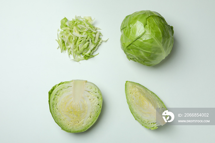 Flat lay with fresh cabbage on white background