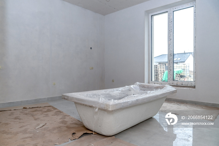 bathtub on the construction site ready for installation