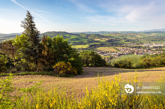 View of the little town of Rio Salso from Belvedere Fogliense, in the Marche region of Italy. The village of Montefabbri, the town of Urbino and the mounts Nerone and Catria appear in the background